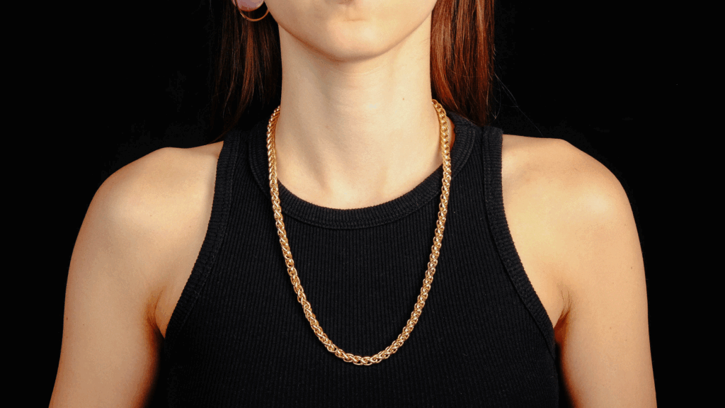 Woman Wearing Gold Long Necklace